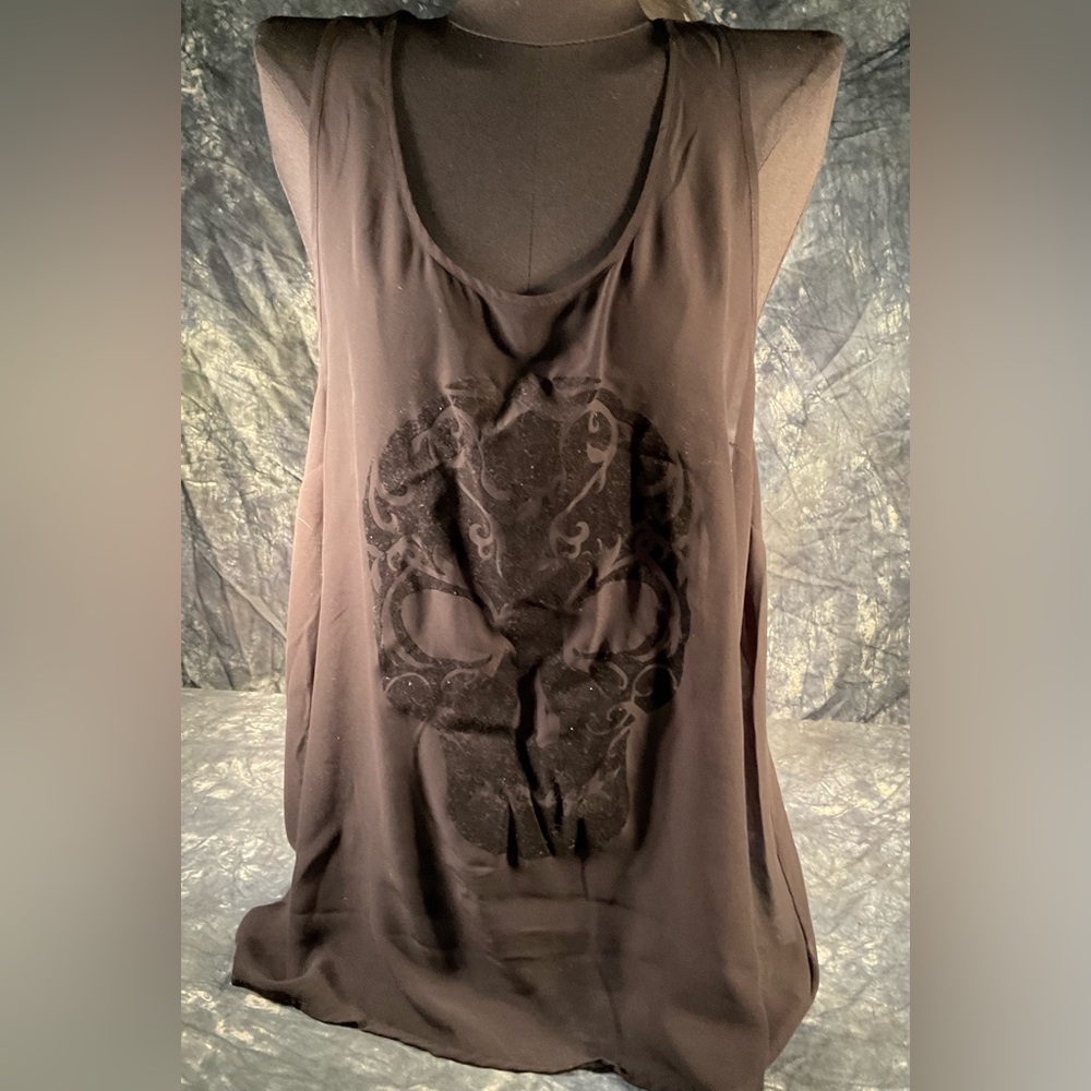 Divided sheer top.